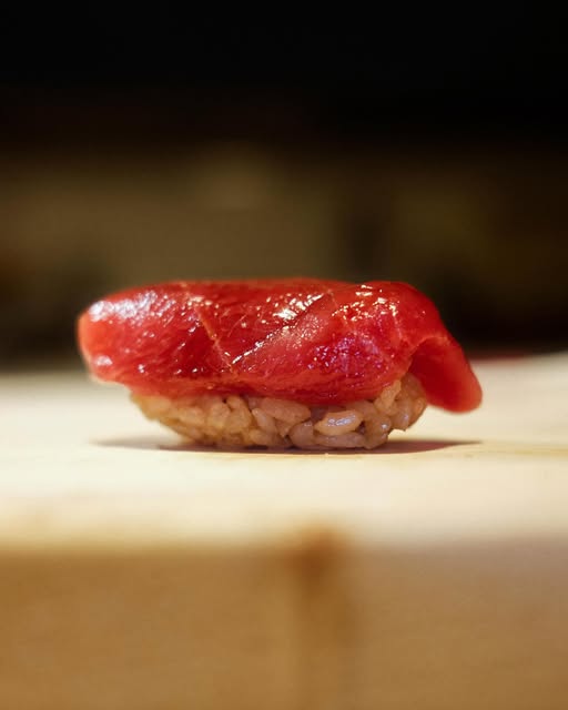 Tuna nigiri on the Handyman Sushi counter — from @handymansushi on Instagram